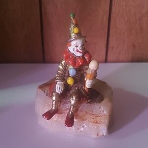 Colorful Clown Figurine on Stone Base